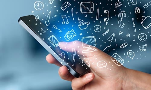 Person-using-phone-with-digital-icons Person-using-phone-with-digital-icons